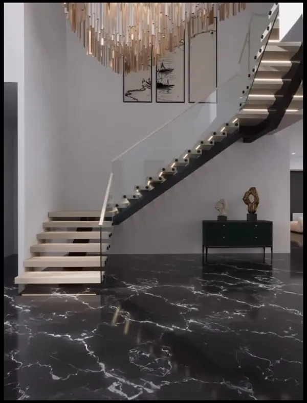 Completed custom floating staircase with hidden supports in a Palm Beach home